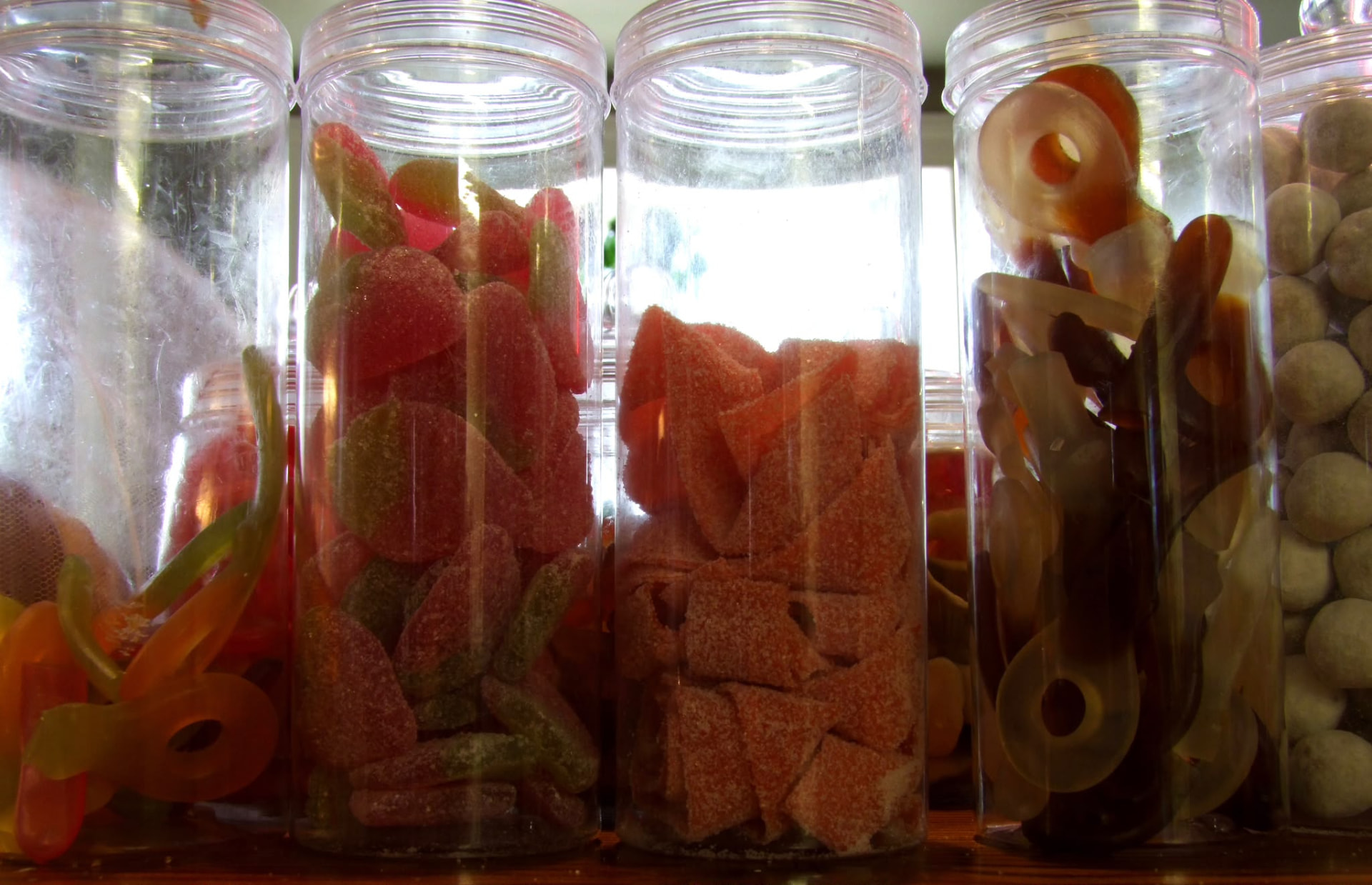 Jars of sweets lined up on the counter at Cupán C